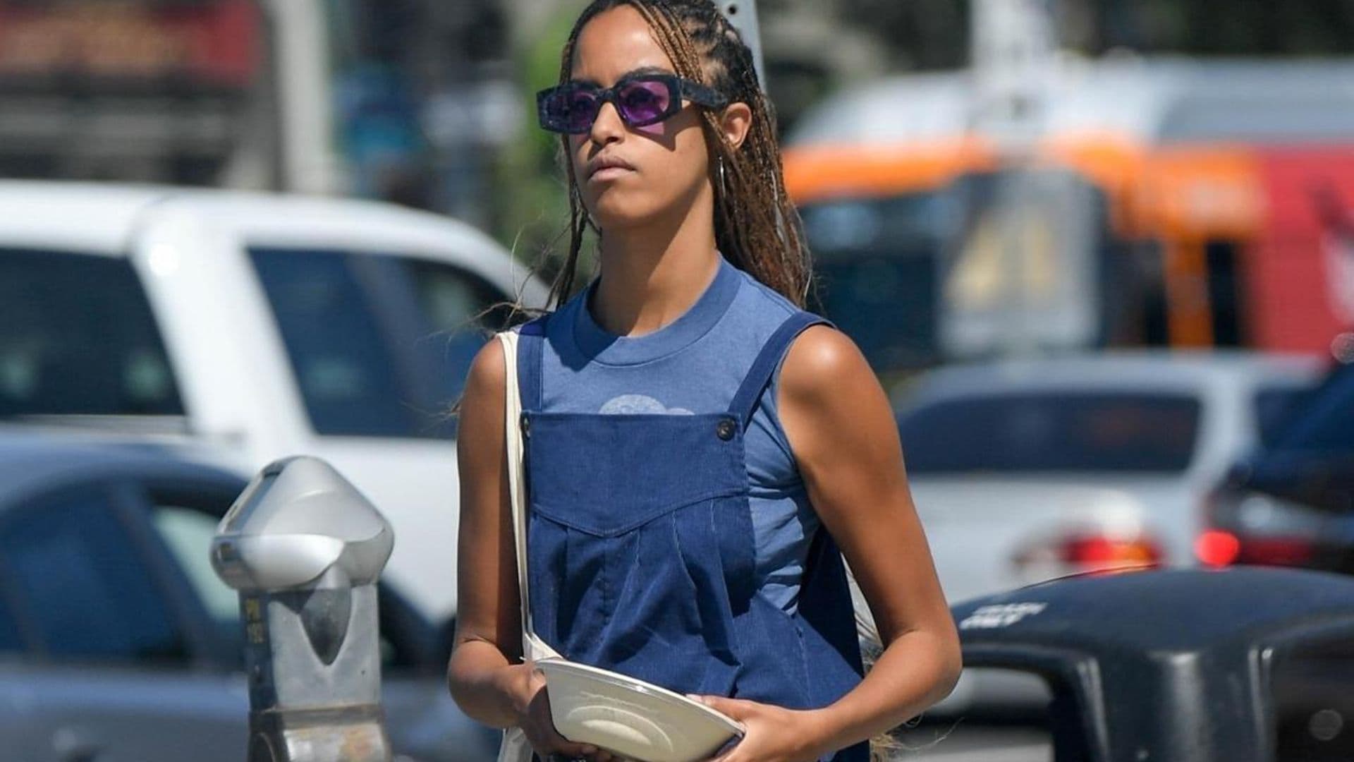 Malia Obama pairs a preppy dress with some stylish Marc Jacobs boots