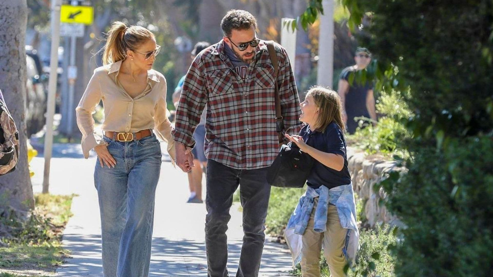 Jennifer Lopez and Ben Affleck pack on PDA while picking up one of their kids from school