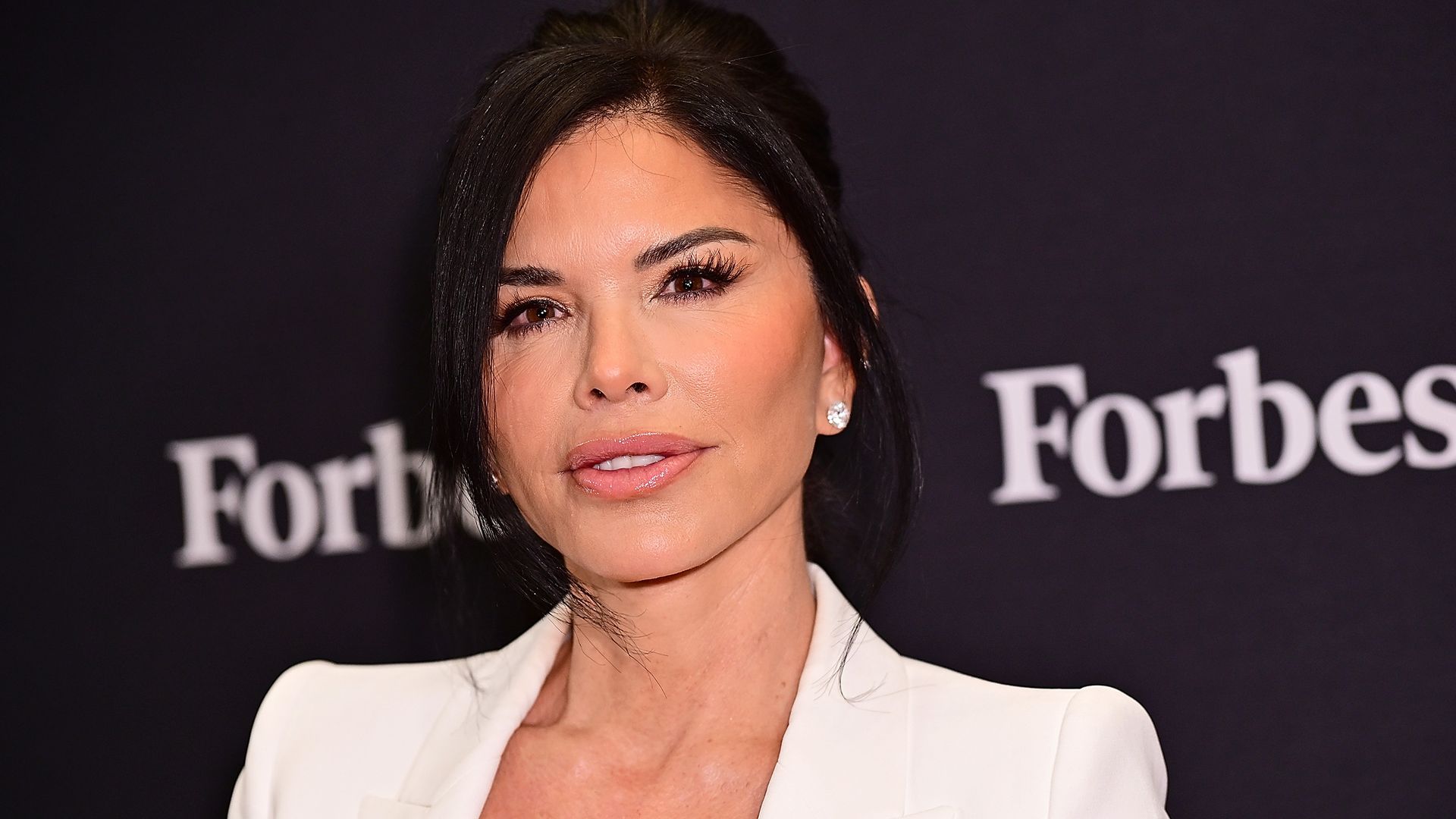 Lauren Sanchez turns heads in lace corset while responding to criticism over her outfits