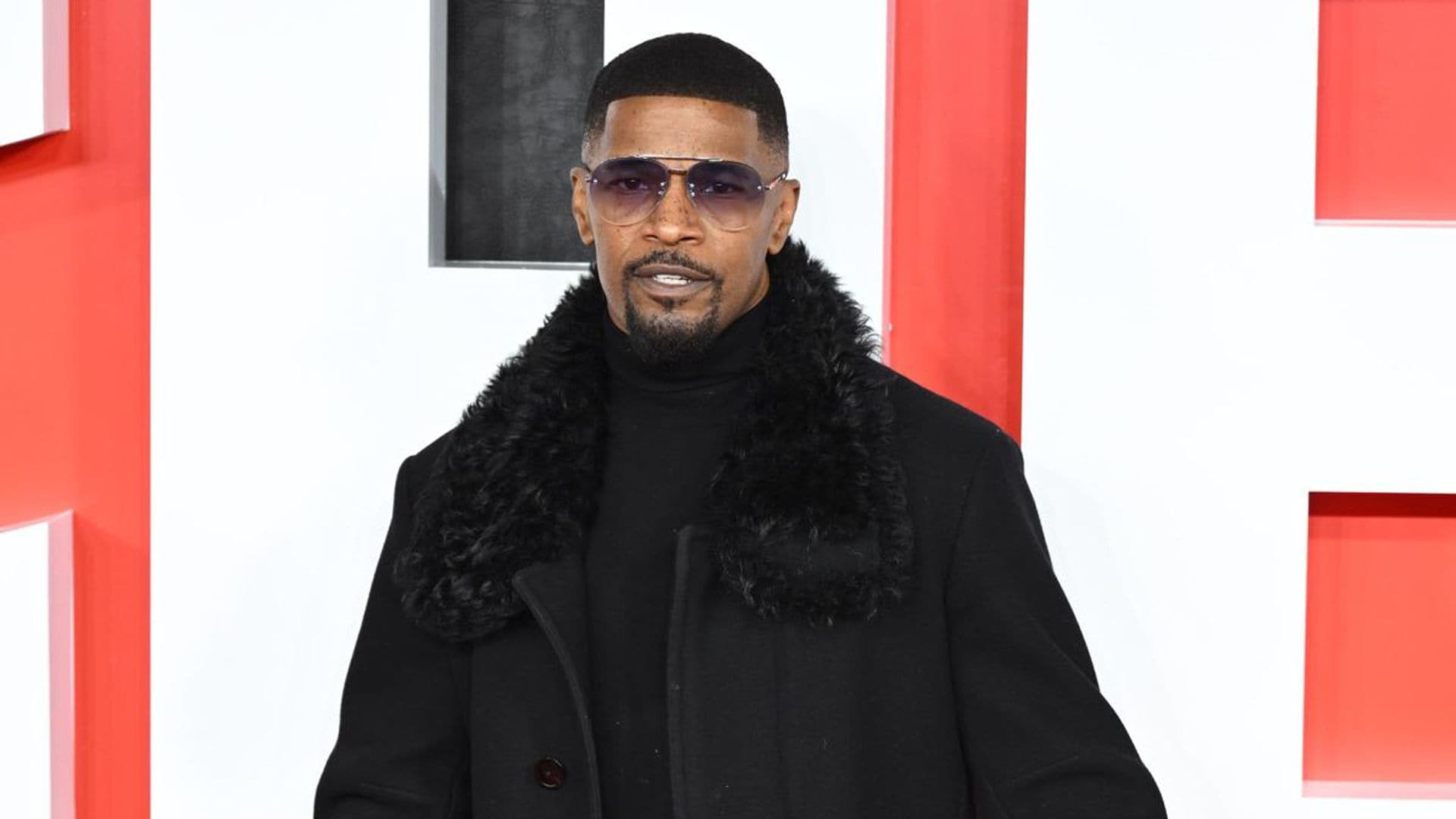 Jaime Foxx seen looking healthy and helping out a woman after his hospitalization