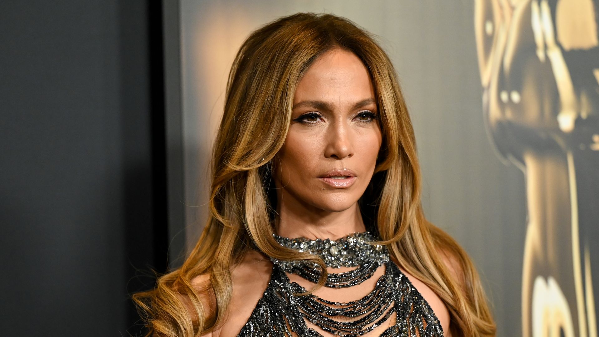 Jennifer Lopez shares a sizzling bikini pic wearing a cowboy hat and snow boots