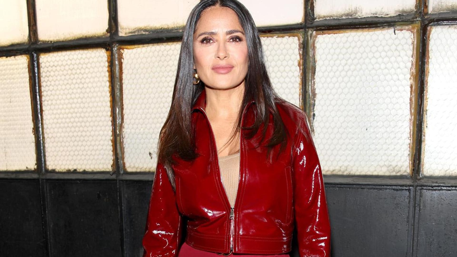 Salma Hayek proves red is her favorite color with impressive bag collection and platform heels