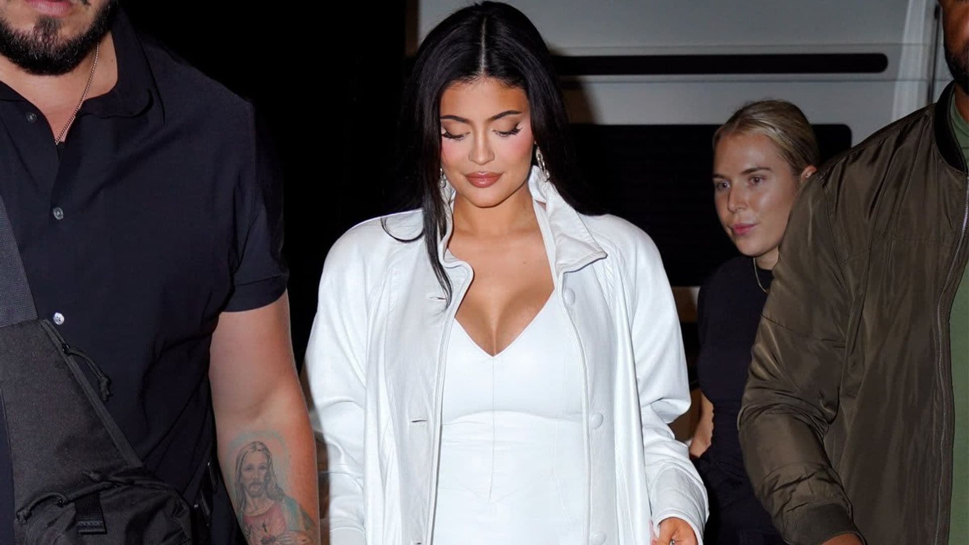 Kylie Jenner showed off her baby bump in a white mini dress at NYFW