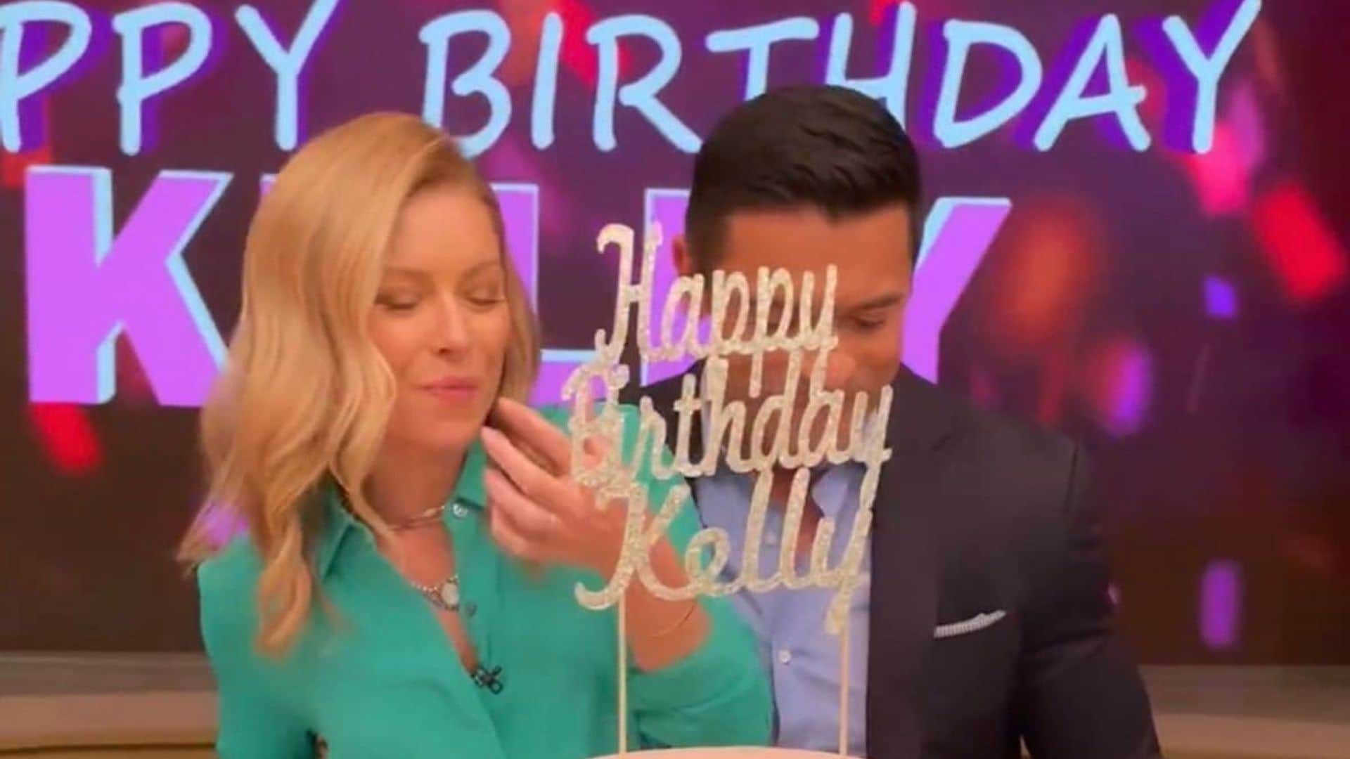 Mark Consuelos surprises Kelly Ripa with cake and roses ahead of her 51st birthday