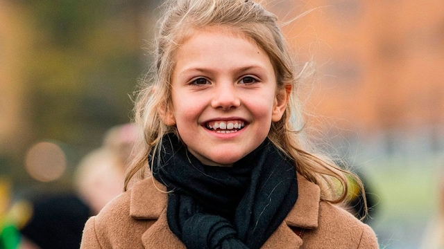 Princess Estelle, 9, steps out to see artwork with her parents