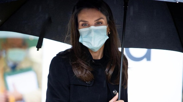 Queen Letizia cuts stylish figure in the rain