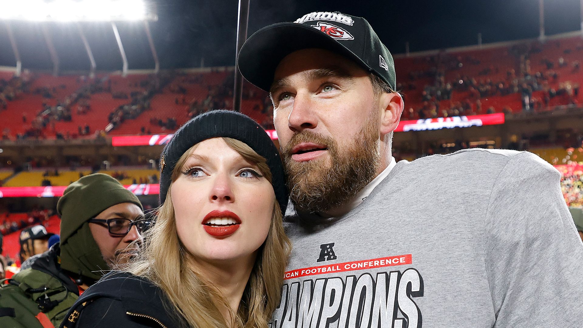 Taylor Swift and Travis Kelce celebrate Super Bowl qualification with a kiss; 'I'm so proud of you'