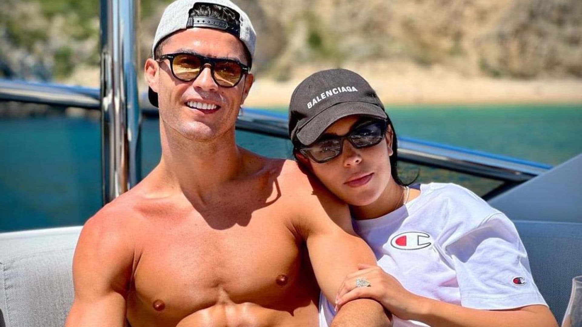 Cristiano Ronaldo shows off his ripped abs aboard a boat, with Georgina Rodriguez