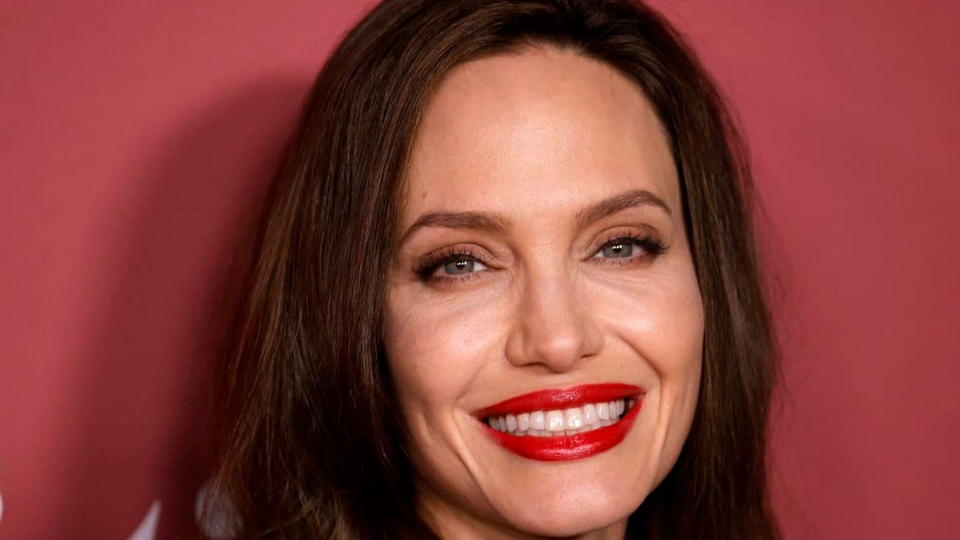 Angelina Jolie signs autographs and takes selfies with fans before private book signing