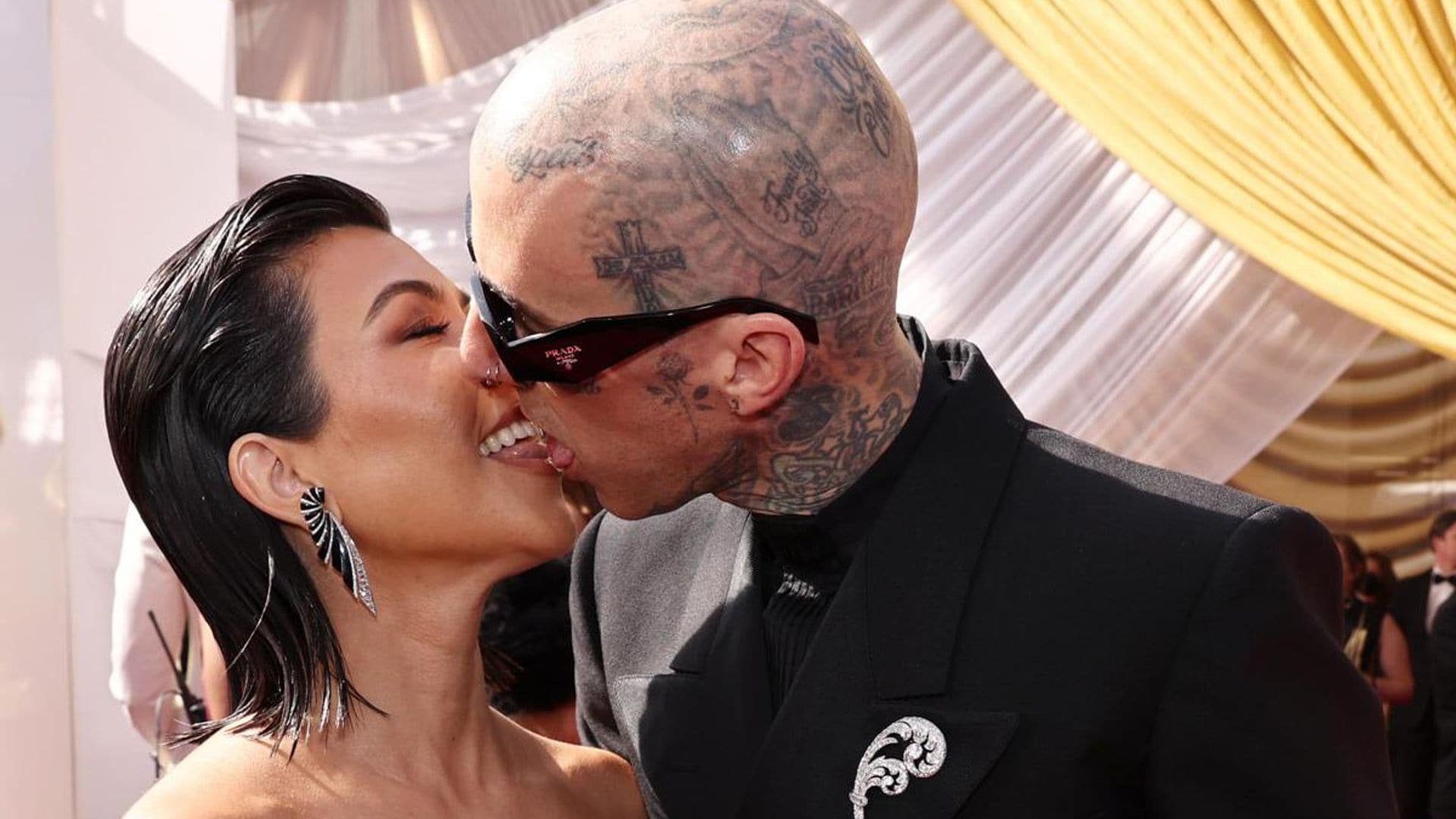 Kourtney Kardashian and Travis Barker take their PDA to the Oscars red carpet