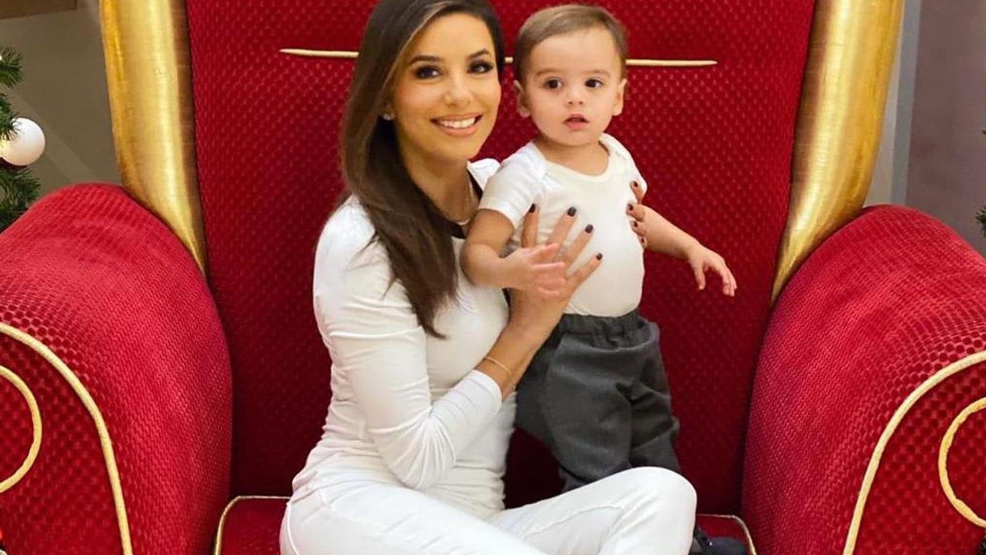 Eva Longoria and son Baby Santi break out serious dance moves as they meet Santa