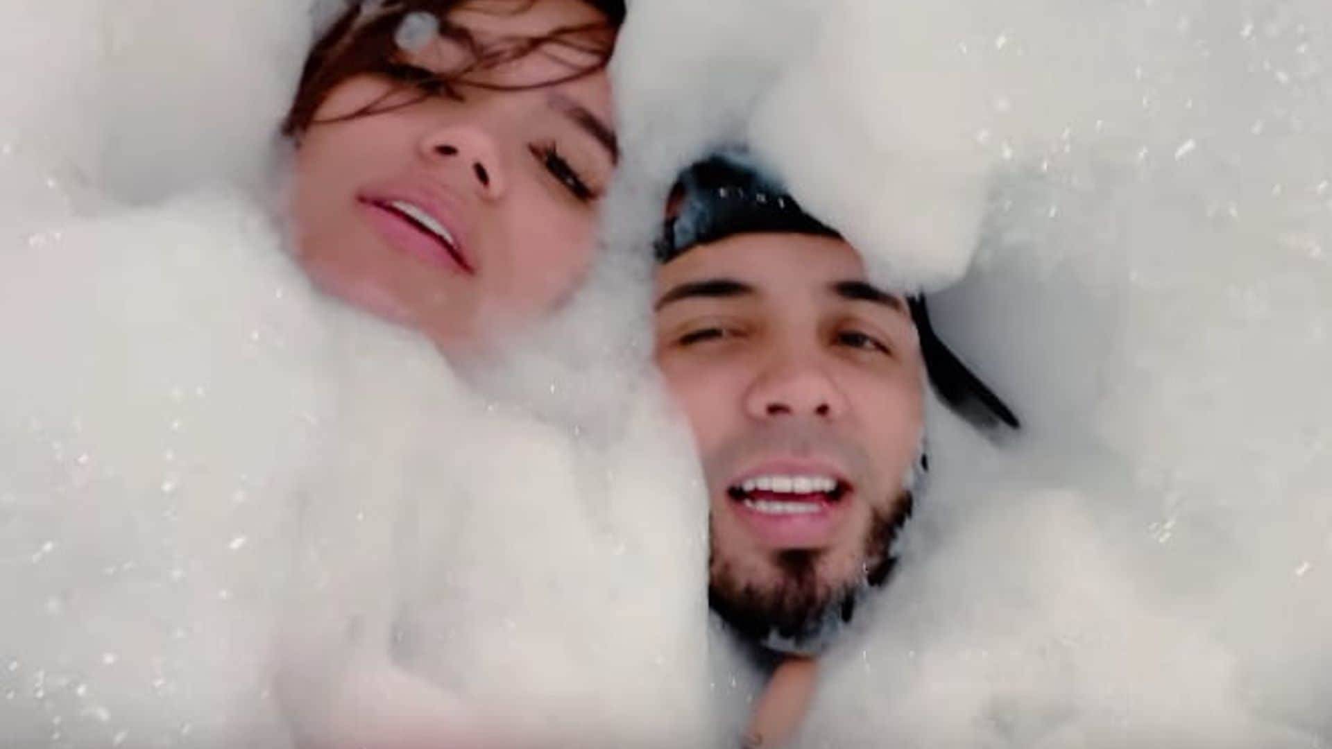 Karol G and Anuel AA give fans a personal look at life in quarantine with ‘Follow’ video