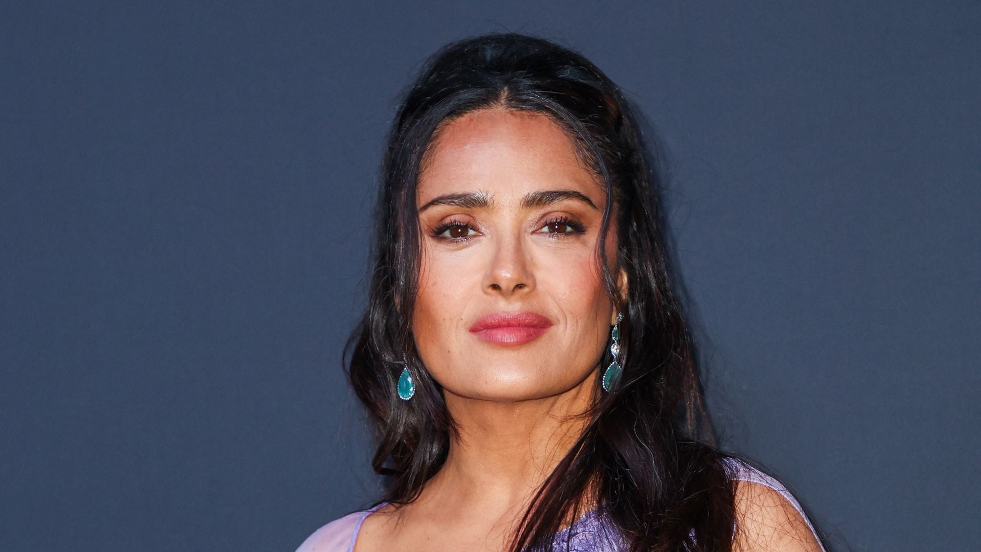 Salma Hayek shows off her summer glow in tiny bikini