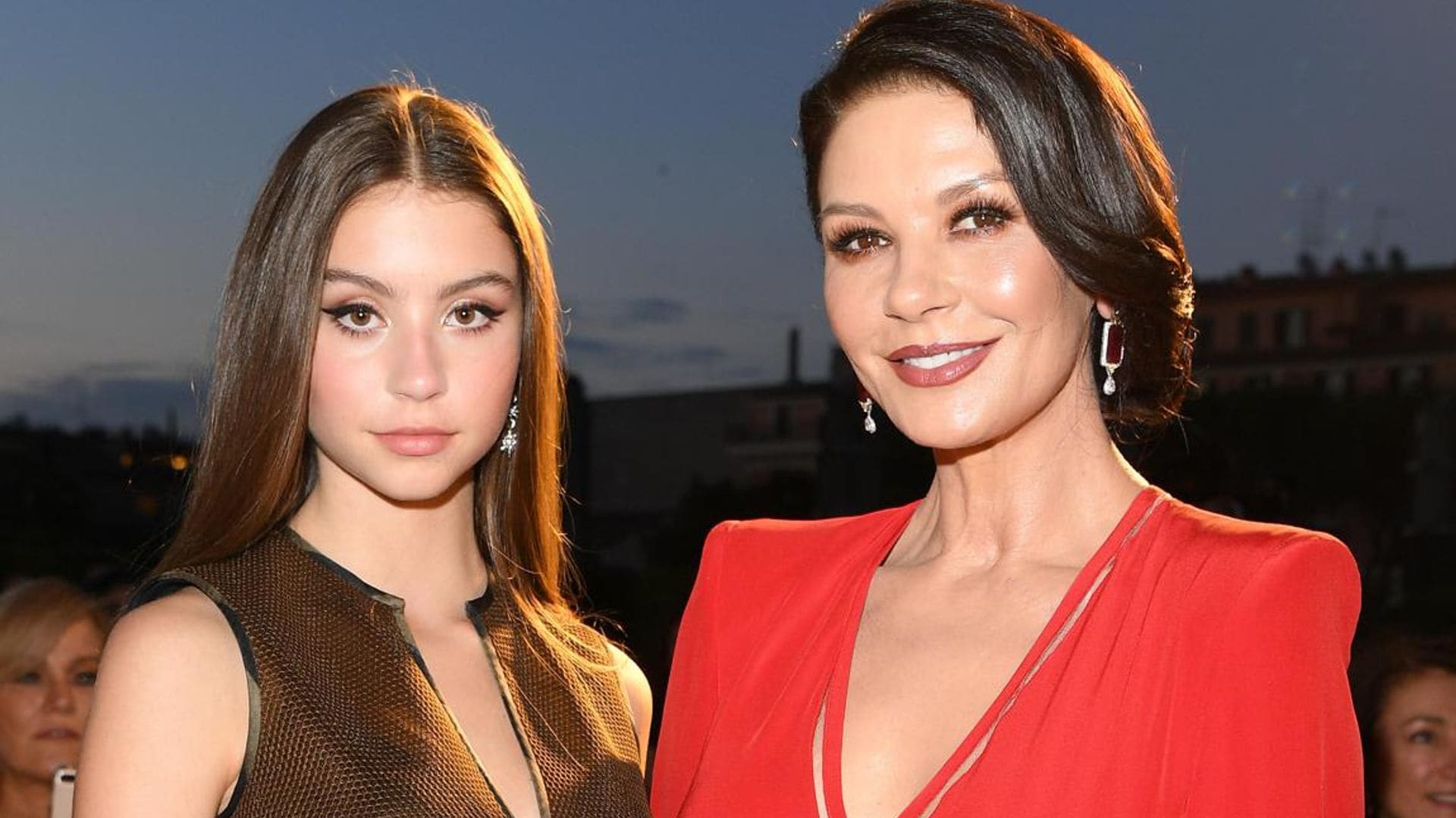 Catherine Zeta-Jones and daughter Carys give baby Taylor his first bath