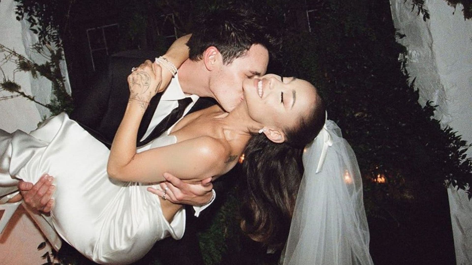 Ariana Grande and Dalton Gomez kiss at their wedding