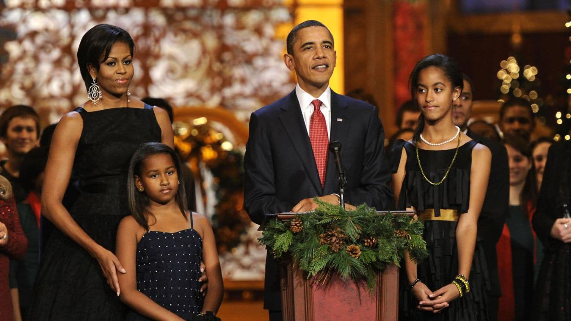 Michelle Obama shares a holiday throwback photo featuring Barack, Malia, and Sasha Obama