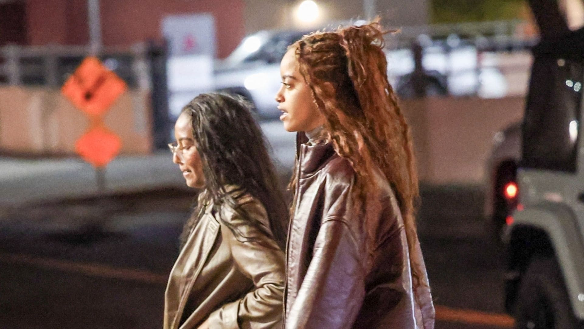 Malia and Sasha Obama wear coordinated leather looks in latest outing with their dad Barack in LA