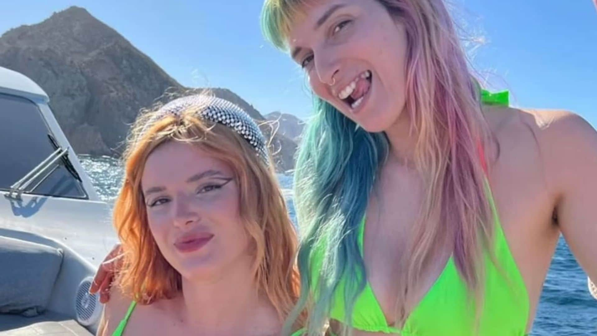 Bella Thorne and her sister Dani flaunt their figures in matching bright green bikinis