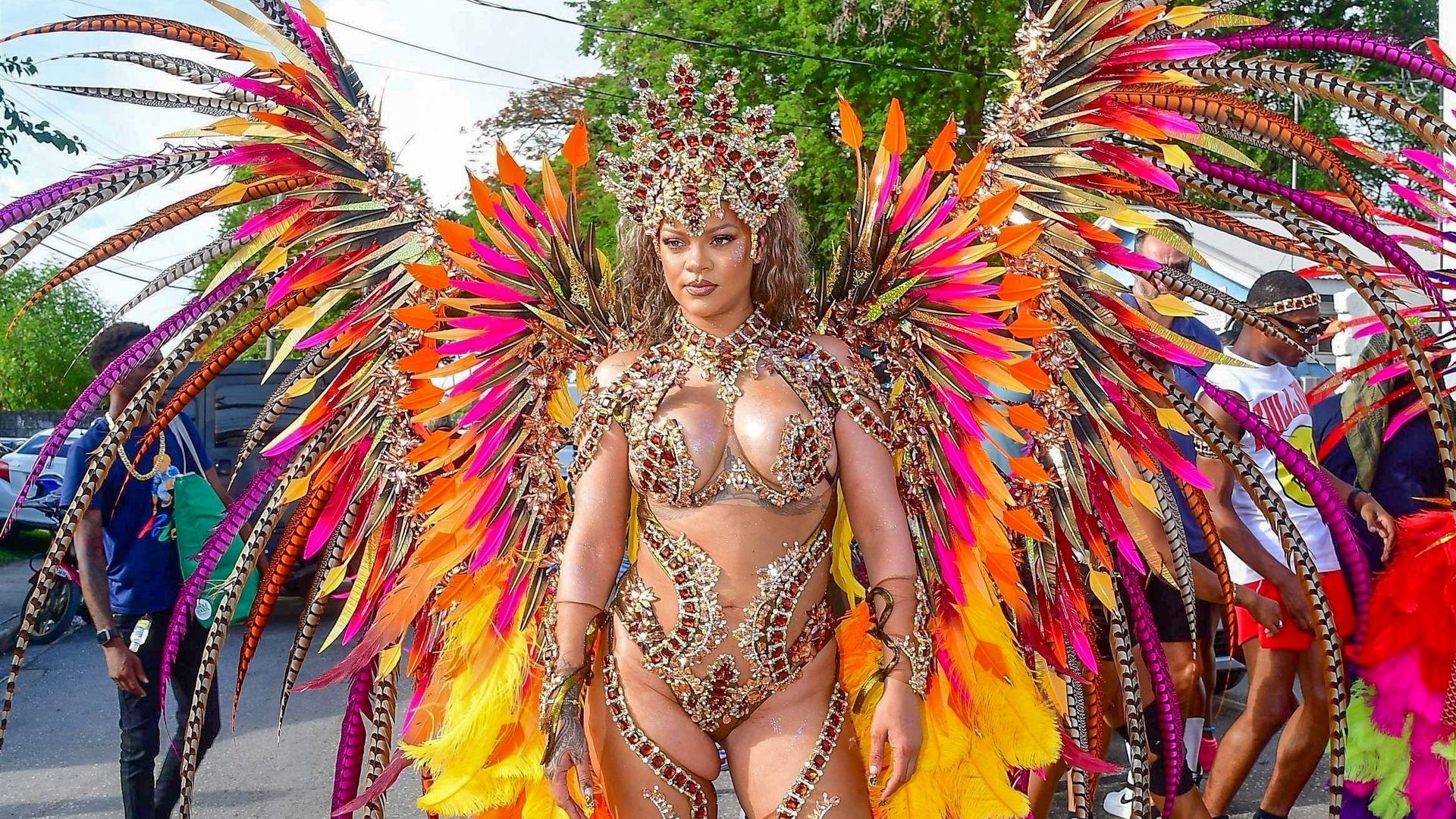 Rihanna shines in Barbados with opulent Carnival look as she celebrates Crop Over Festival