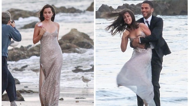 Ana de Armas on set of a commercial at the beach with a male model