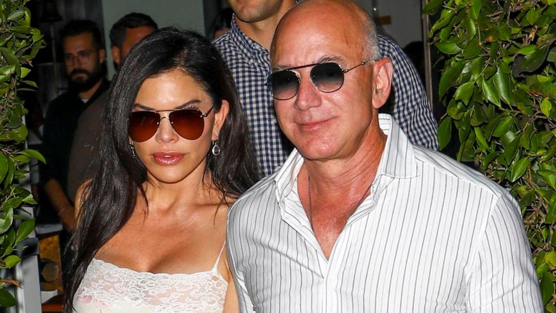 Lauren Sanchez and Jeff Bezos wear matching sunglasses for a romantic dinner