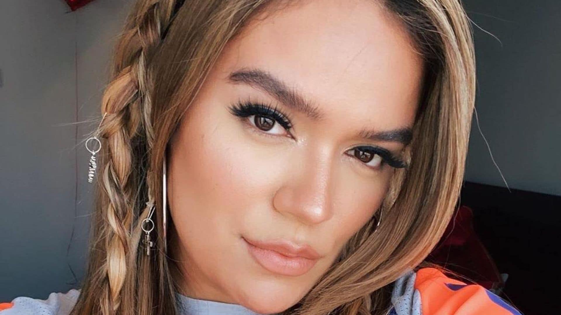 Karol G‘s smile manicure is the beauty pick-me-up we all need right now