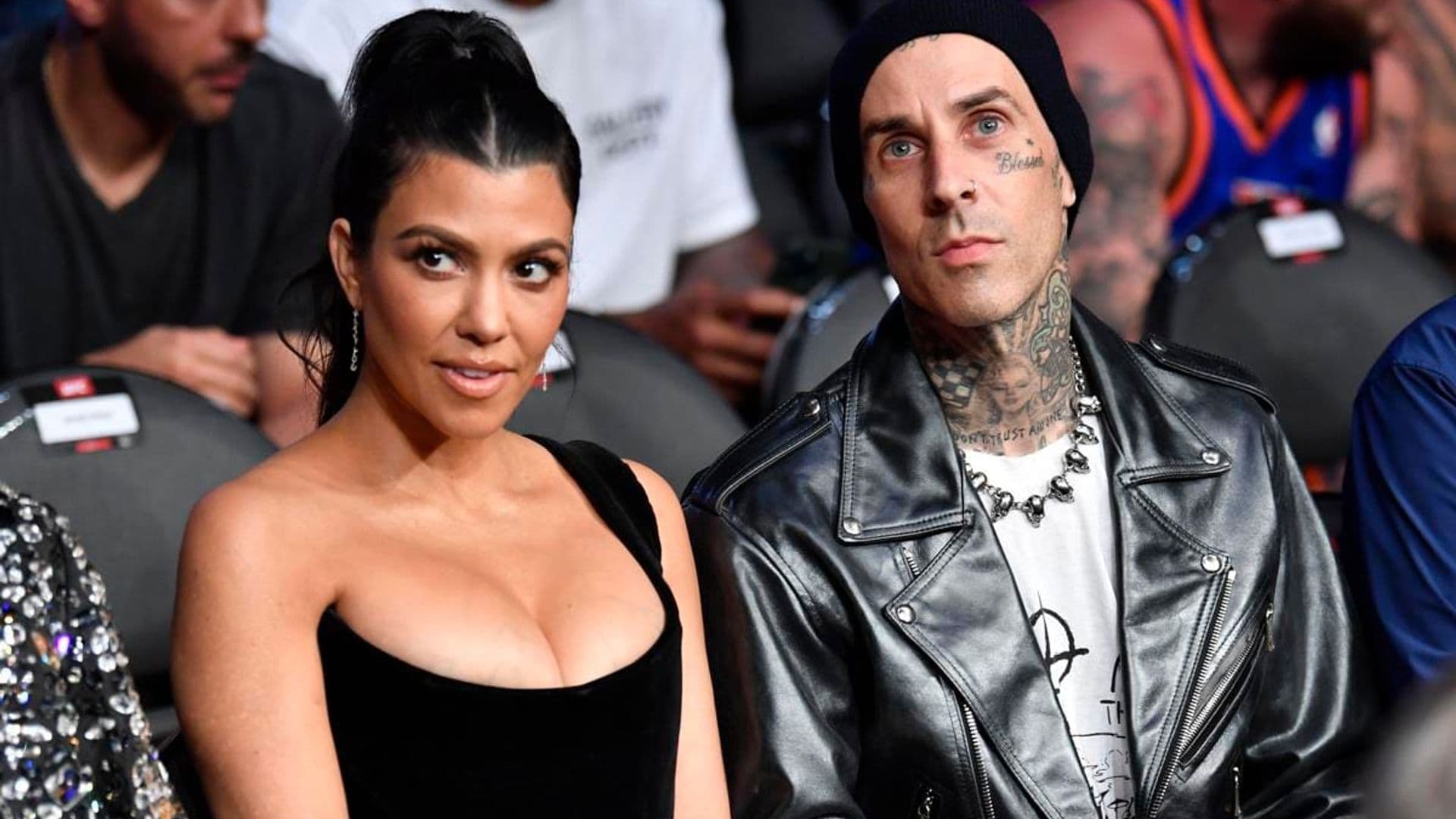 Kourtney Kardashian and Travis Barker’s vampiresque kiss at a UFC fight won