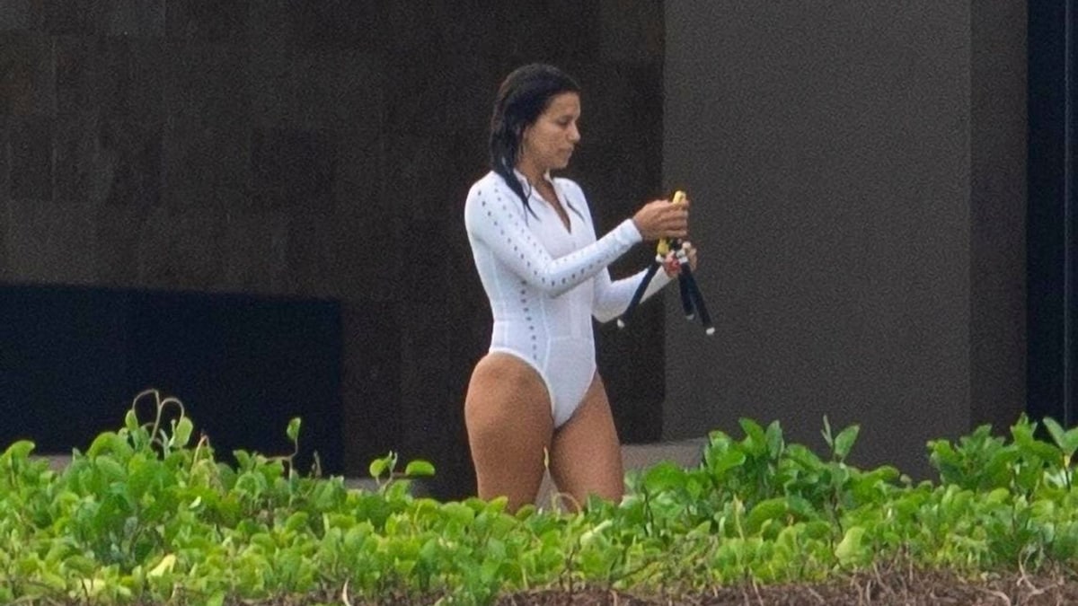 Eva Longoria showed off her curves in a sexy one-piece