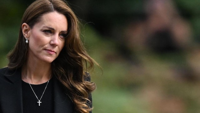 Britain's Catherine, Princess of Wales reacts as she looks at tributes outside Norwich Gate on the Sandringham Estate in Sandringham, eastern England, on September 15, 2022, following the death of Queen Elizabeth II. - As preparations build for next week's state funeral, Prince William and his wife Catherine -- the new Prince and Princess of Wales -- visit Sandringham, where the queen used to spend Christmas. (Photo by Daniel LEAL / AFP) (Photo by DANIEL LEAL/AFP via Getty Images)