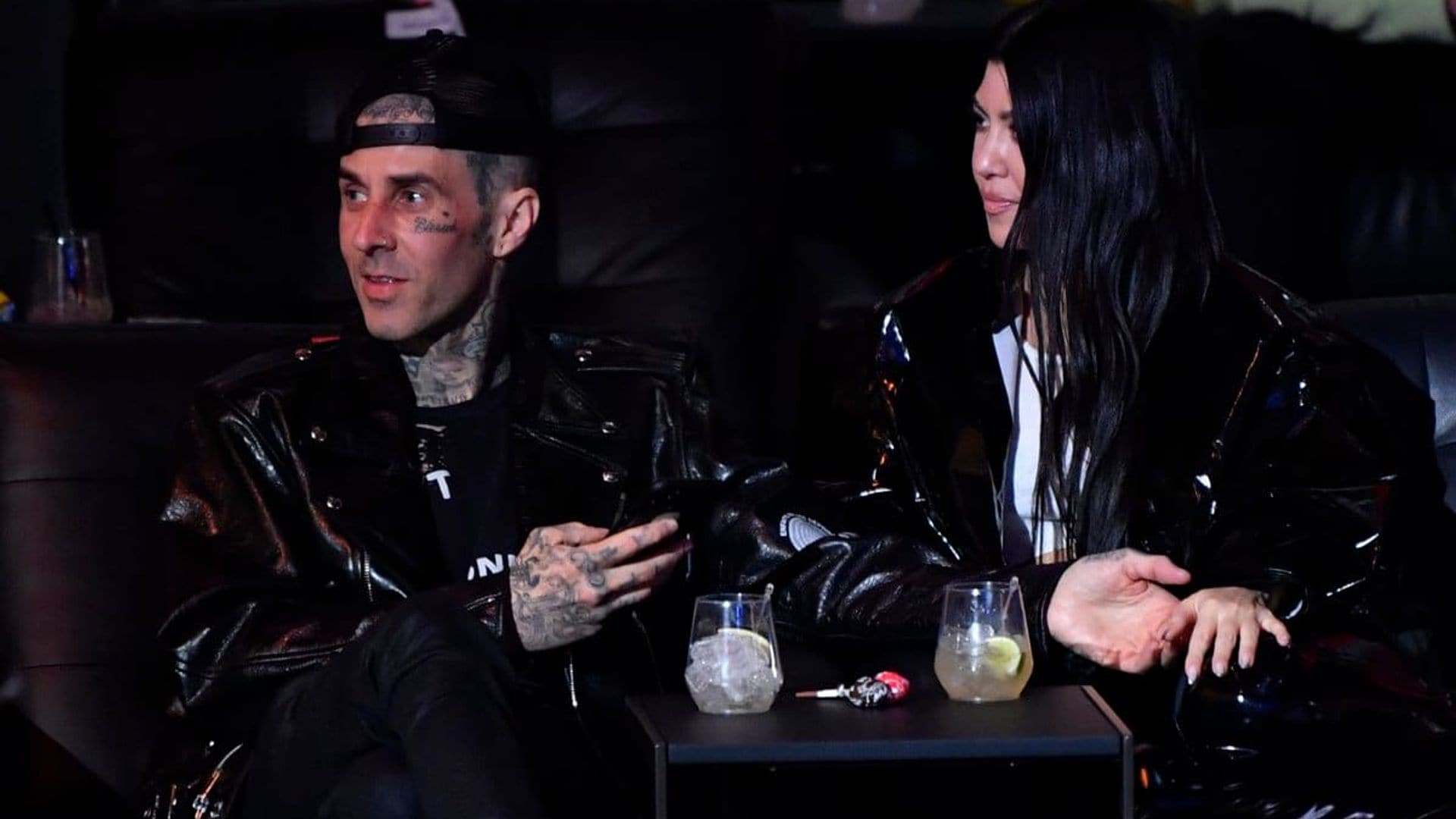 Kourtney Kardashian and Travis Barker have fun in Disneyland with her son