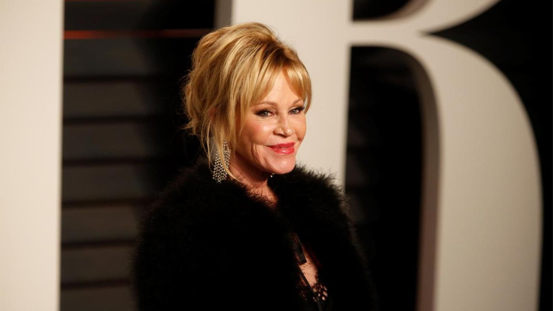 Melanie Griffith shows off her incredible body while wearing lingerie