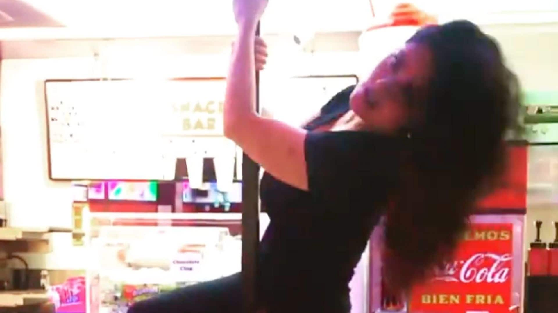 Watch Salma Hayek pole dance in a diner after eating