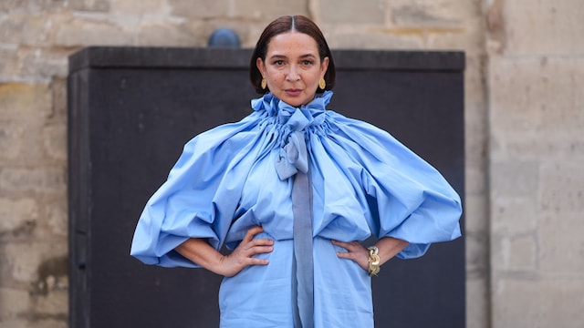 Maya Rudolph wears gold earrings, a gold bracelet, and a light blue puffy short-sleeved Patou maxi dress outside Patou during the Paris Haute Couture Week Fall/Winter 2024-2025 on June 27, 2024, in Paris, France. (Photo by Edward Berthelot/Getty Images)