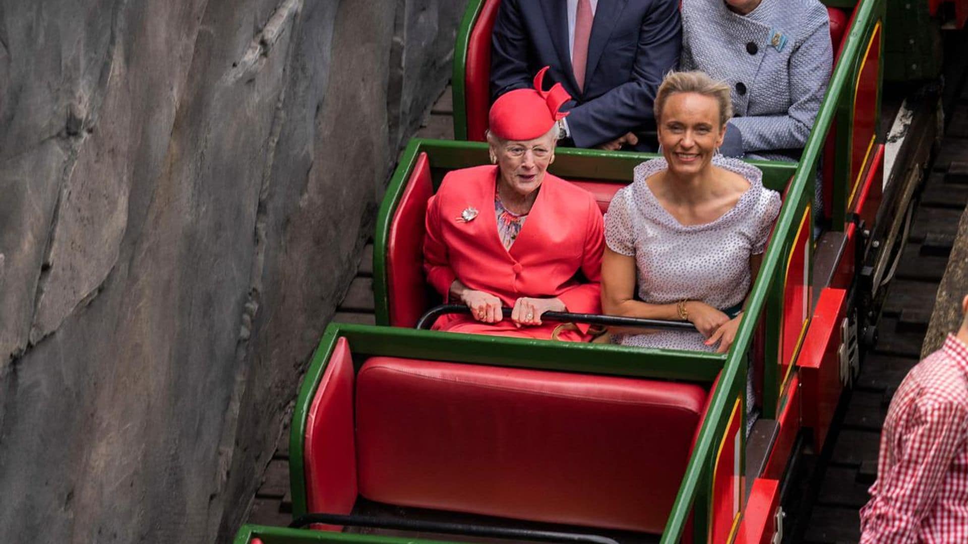 Queen of Denmark goes for a ride on a roller coaster: Watch