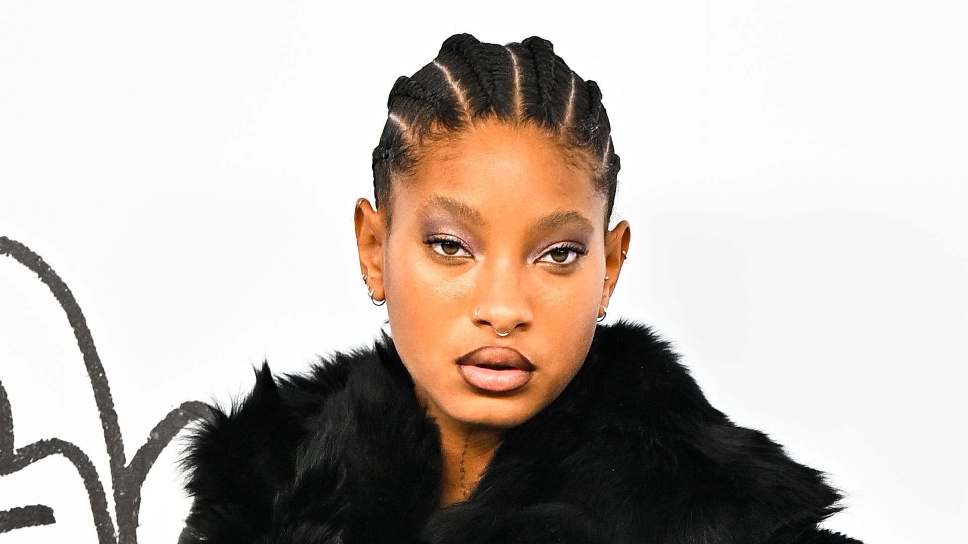 Willow Smith steps out in black bodysuit and thigh-high stockings in latest Paris Fashion Week outing [PHOTOS]