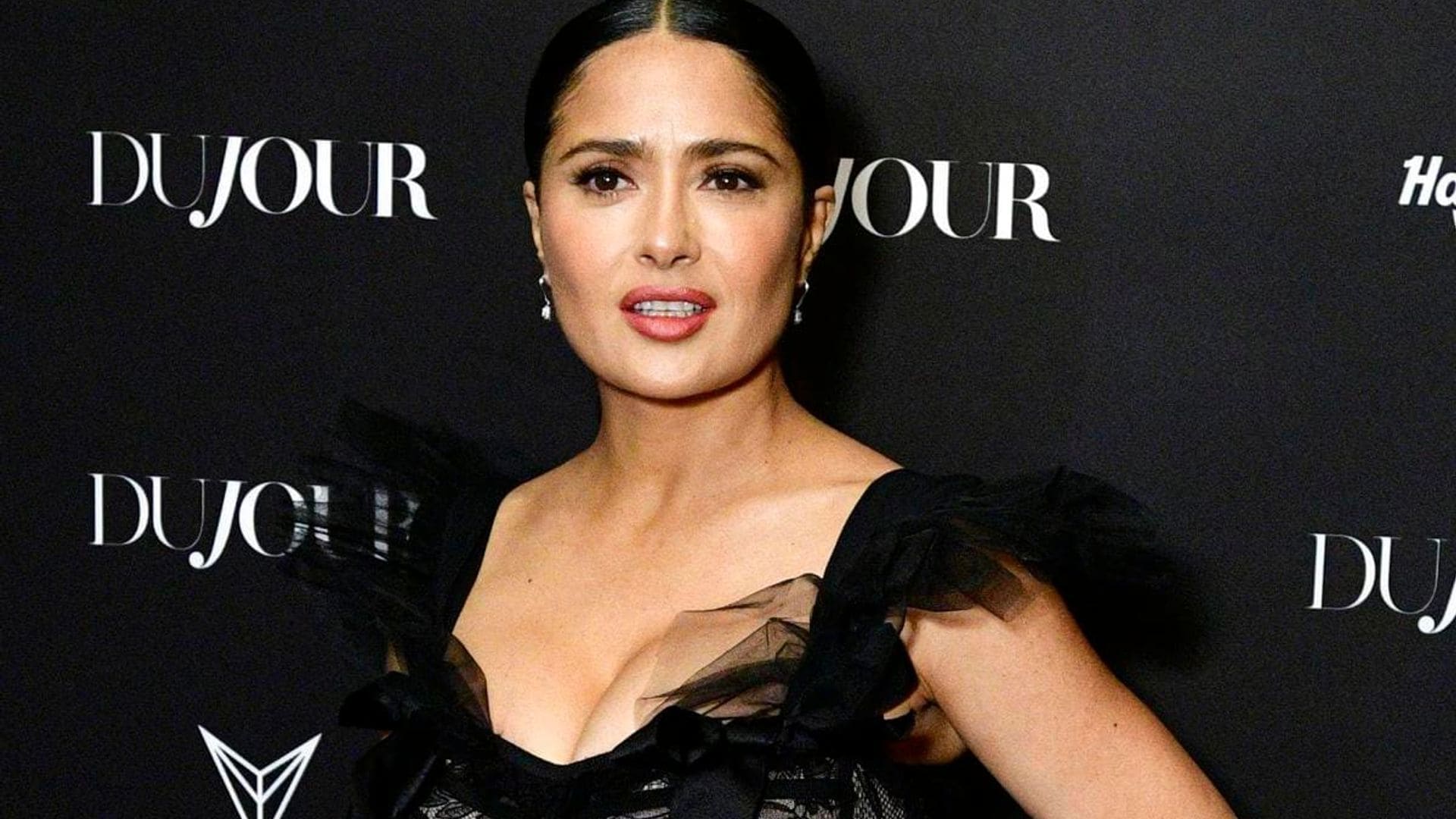 Salma Hayek wears a lacy black gown and parties at NYC event