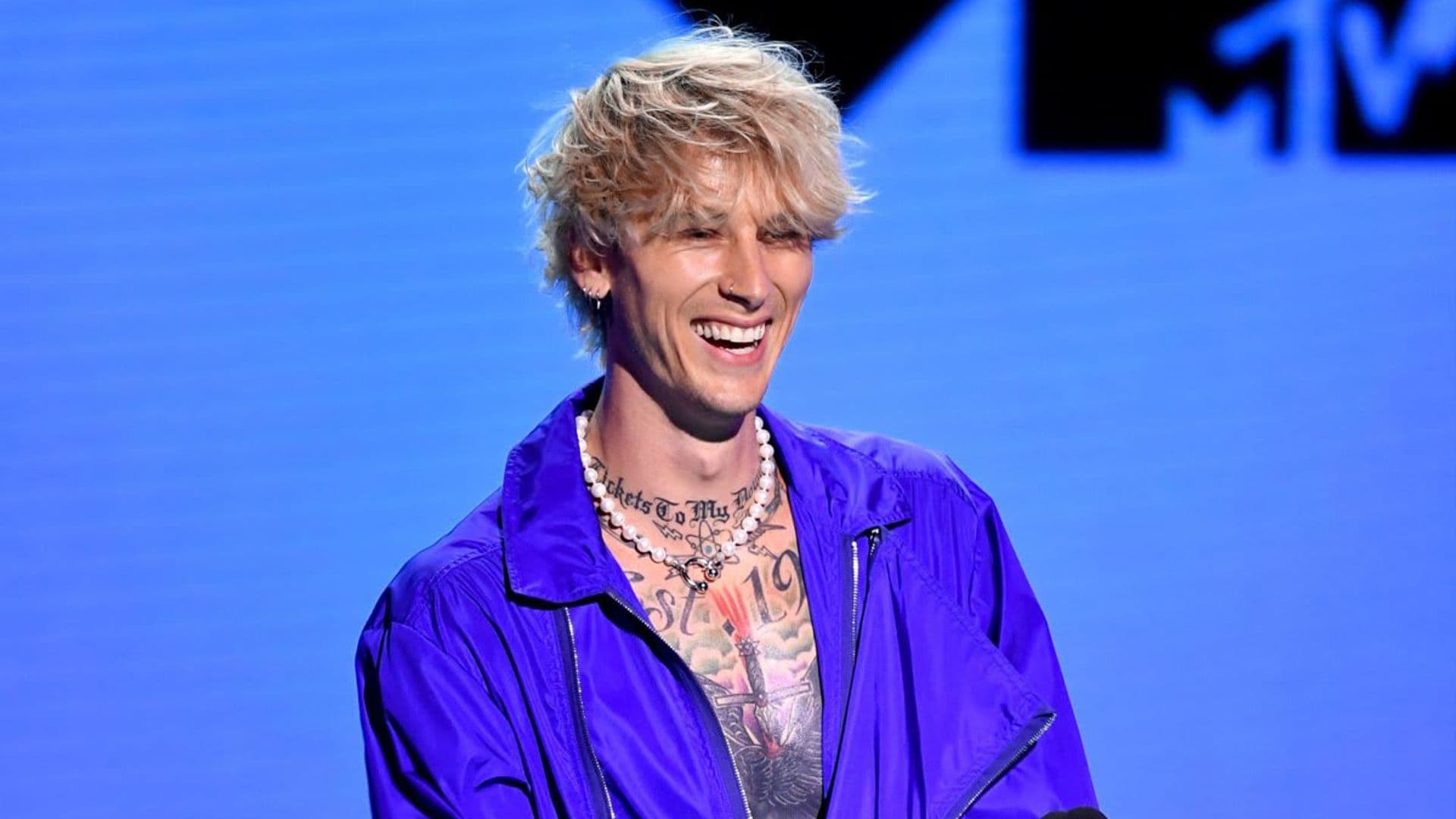 Fans are skeptical if Machine Gun Kelly’s newly shaved head is real or a bald cap