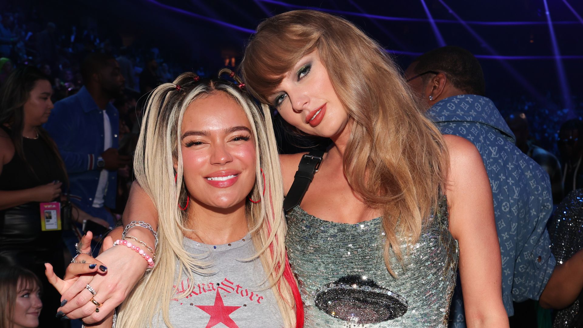 Karol G dances with Taylor Swift and Camila Cabello during her VMA performance