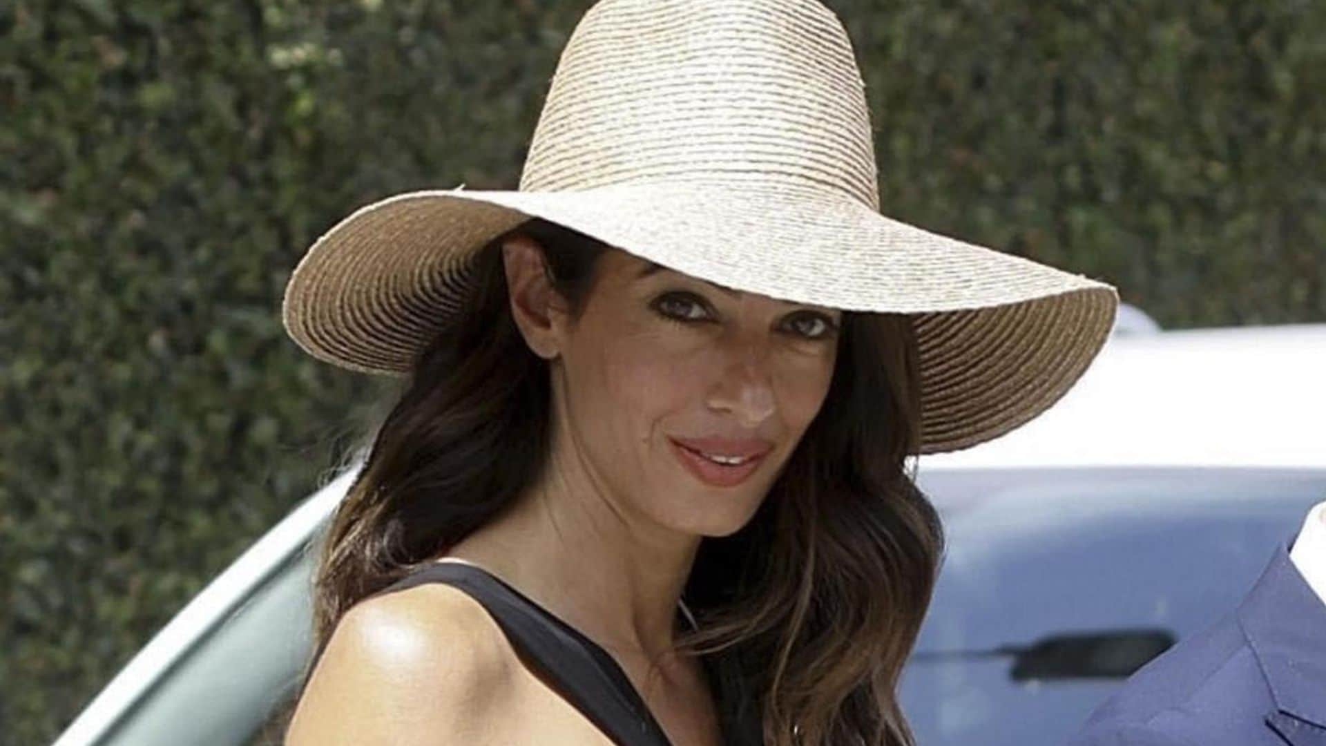 Amal Clooney looks effortlessly chic with her favorite summer accessory: See pics