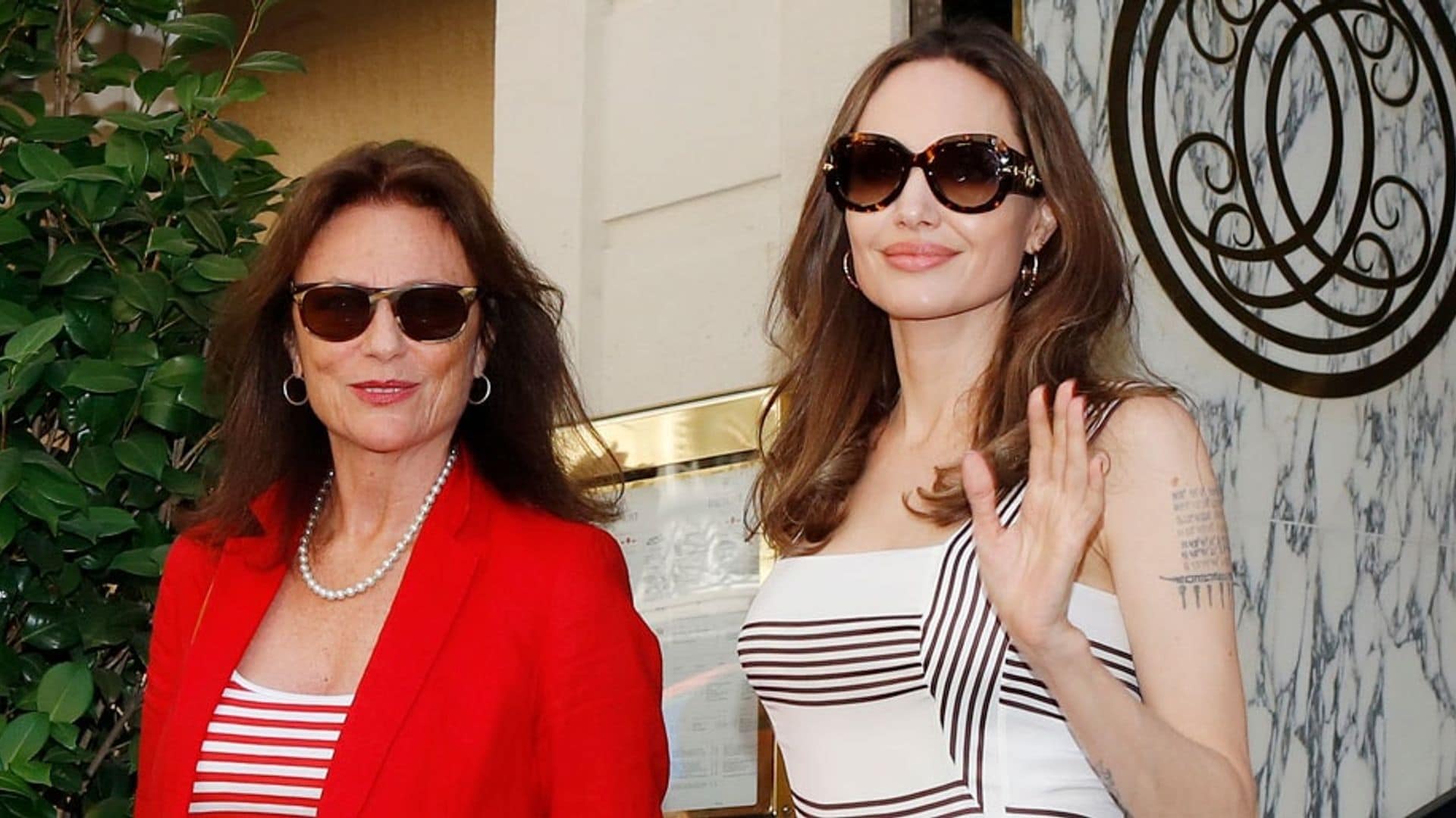 Angelina Jolie and her godmother take on Parisian elegance with a series of twinning looks