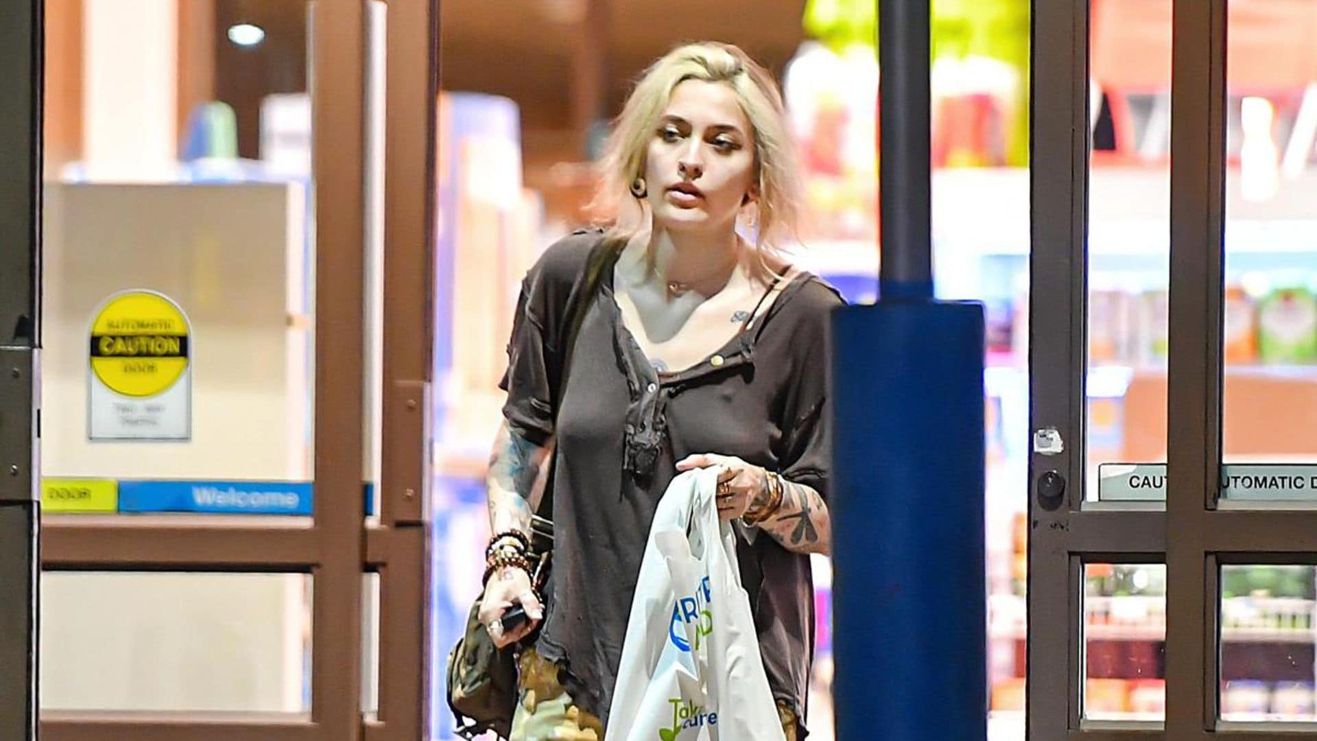 Paris Jackson wears a casual grunge outfit while out shopping