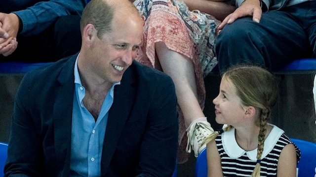 Prince William flies Princess Charlotte in a helicopter