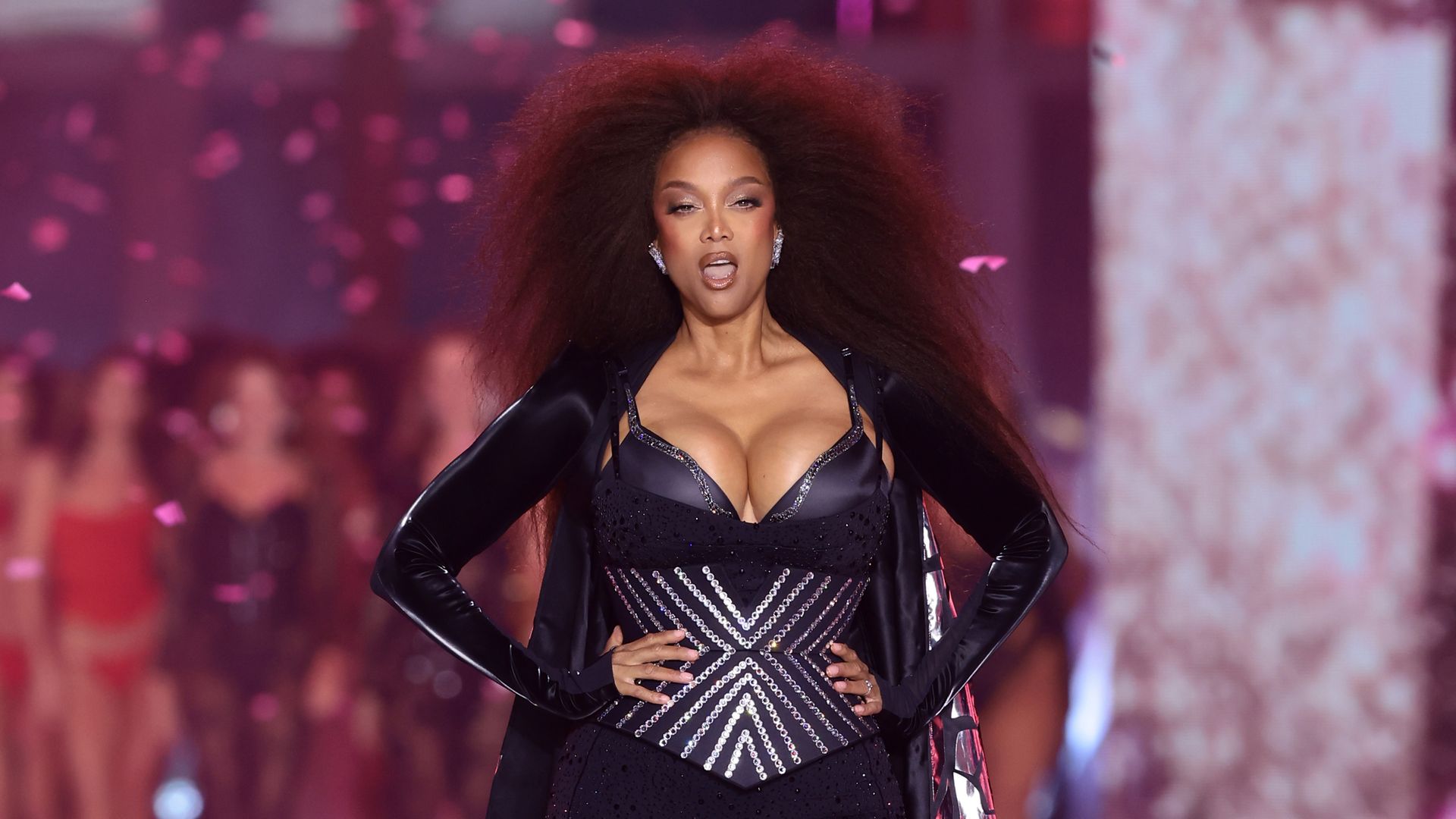 Tyra Banks humorously acknowledged weight gain while reflecting on her iconic comeback to the Victoria's Secret Fashion Show