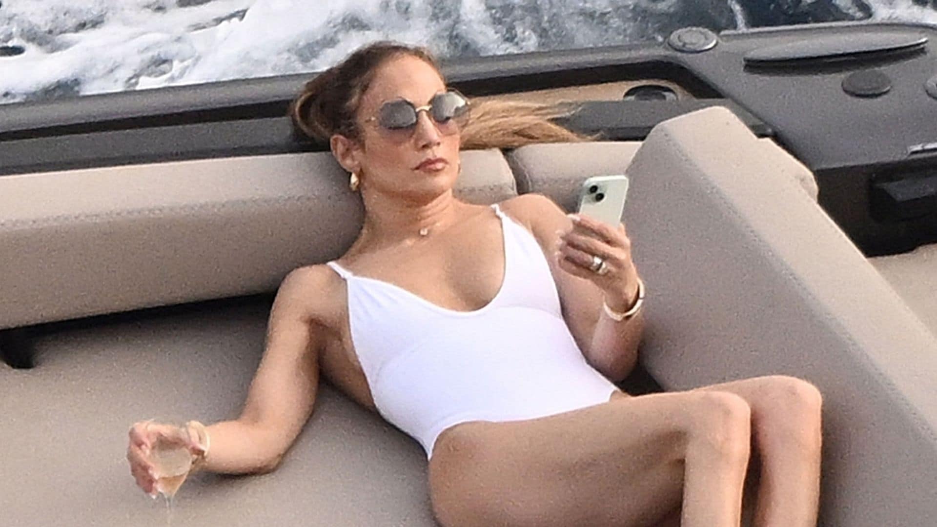 Jennifer Lopez is all smiles in white swimsuit while vacationing in Italy