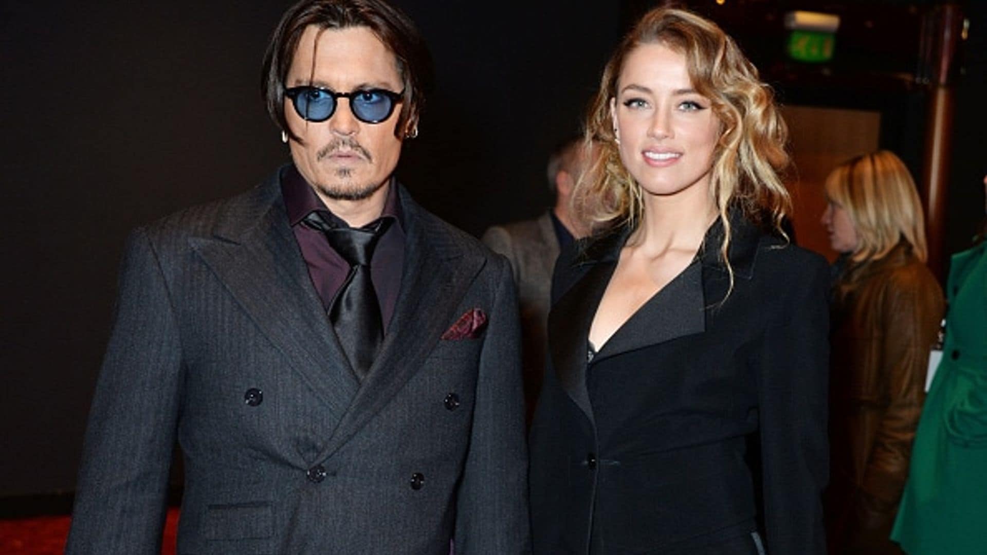 Johnny Depp and Amber Heard get goofy at 'Mortdecai' premiere