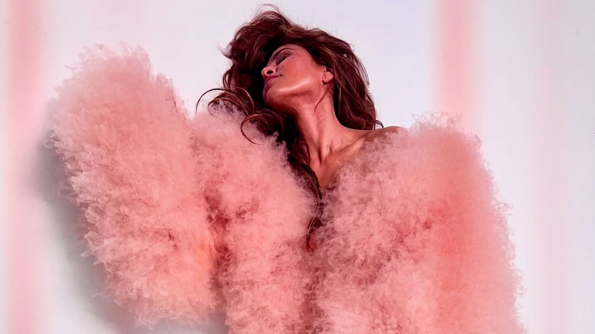 Eva Mendes drops an F-Bomb in a sexy pink Stella McCartney coat—and we love the reason behind it