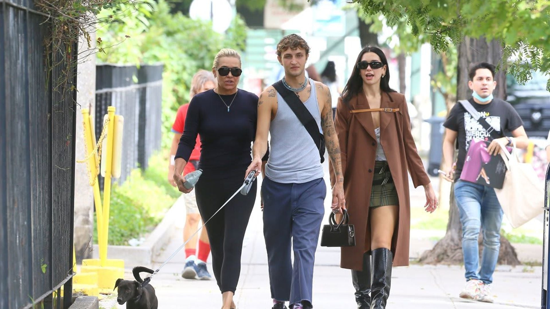 Dua Lipa looked fall ready while on a stroll with boyfriend Anwar and Yolanda Hadid