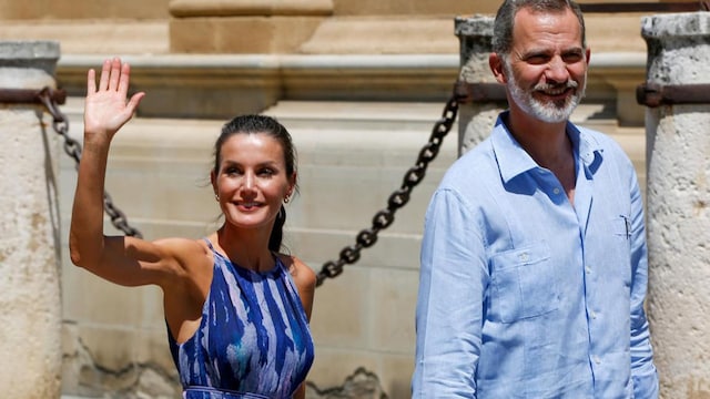 Queen Letizia turned heads in a printed summer dress by Adolfo Dominguez for her trip to Seville