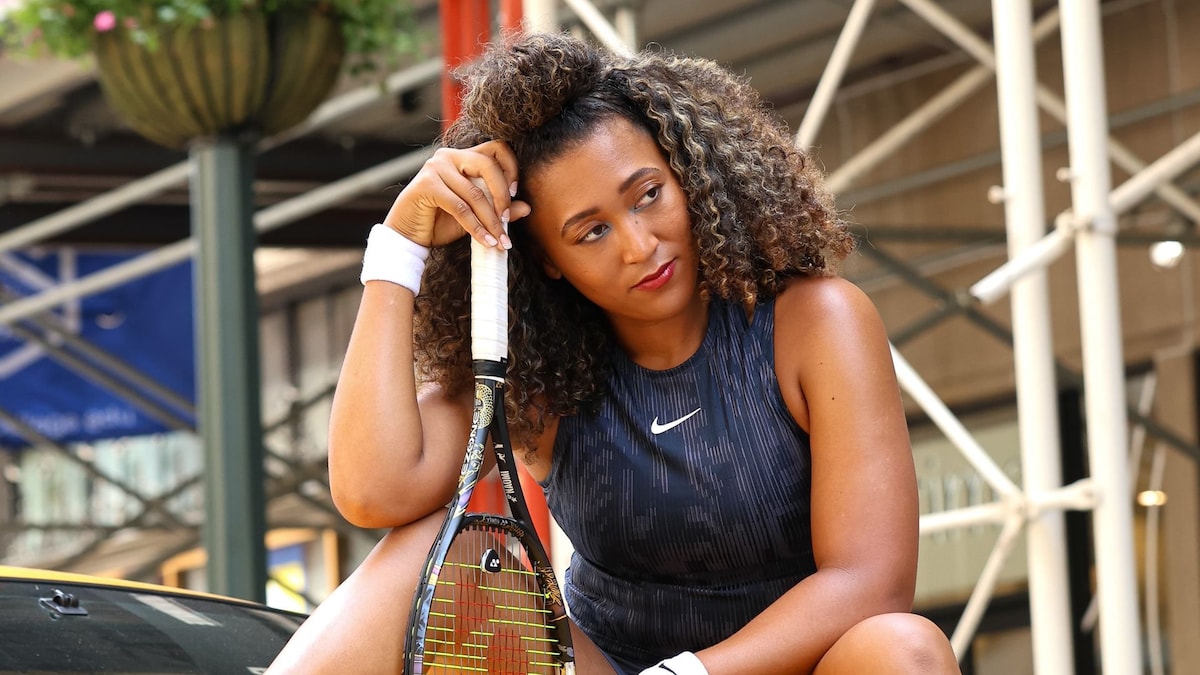 Naomi Osaka shows the instant meals Team Japan had in their Olympic bag