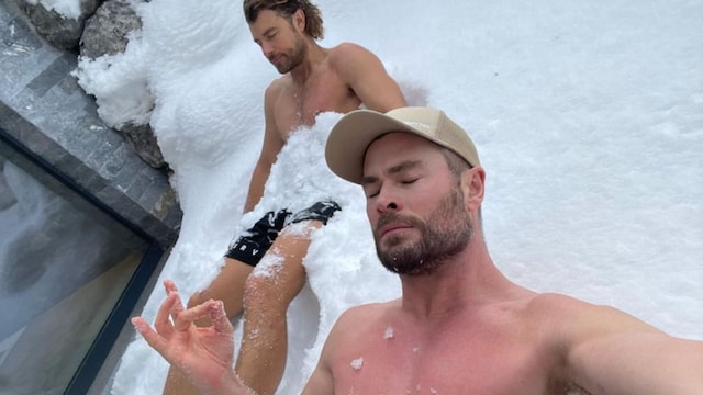 Chris Hemsworth ditches ice baths for a shirtless 'snow bath' to soothe his muscles